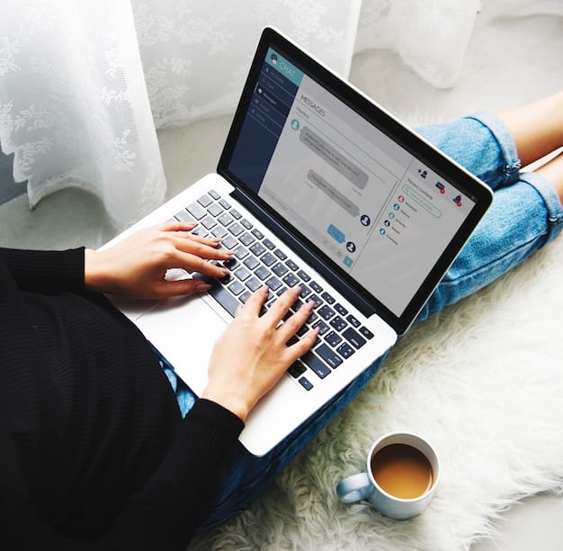 A Woman Sitting on the Floor and Using Laptop